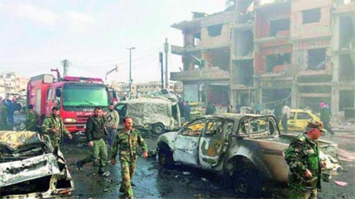 76 killed in bomb blasts in Syria’s Homs, Damascus